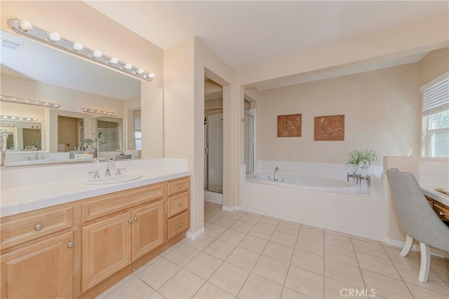 25228 Coral Canyon Rd, Corona, CA 92883 - full bathroom with vanity, a garden tub, tile patterned flooring, and a stall shower