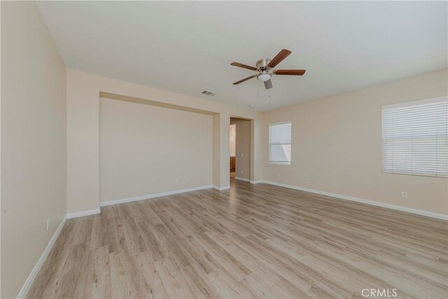 25228 Coral Canyon Rd, Corona, CA 92883 - spare room with a ceiling fan and light wood finished floors