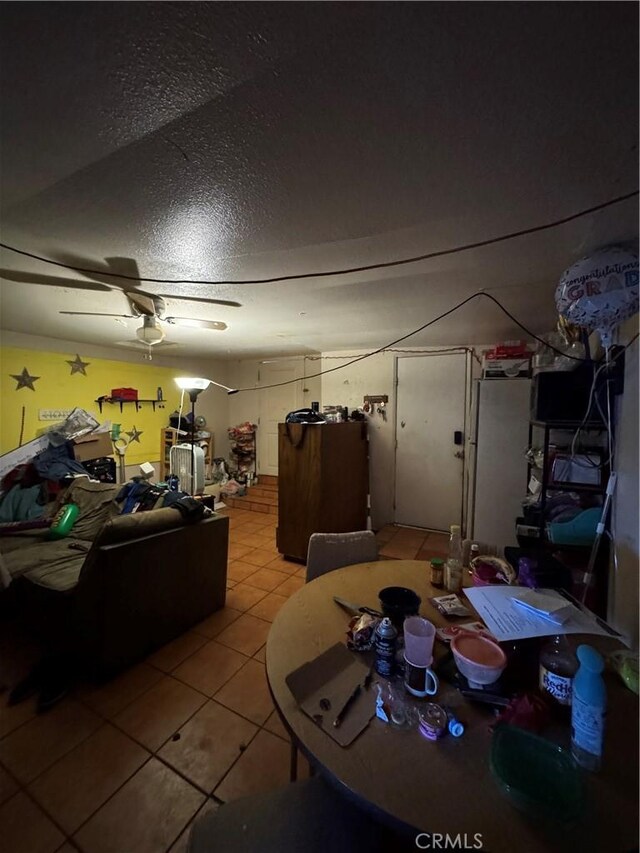 24610 Webster Ave, Moreno Valley, CA 92553 - dining area with light tile patterned floors and a ceiling fan
