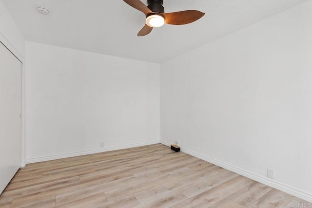 7528 Jerez Ct Unit 6, Carlsbad, CA 92009 - empty room with ceiling fan, wood finished floors, and a smoke detector