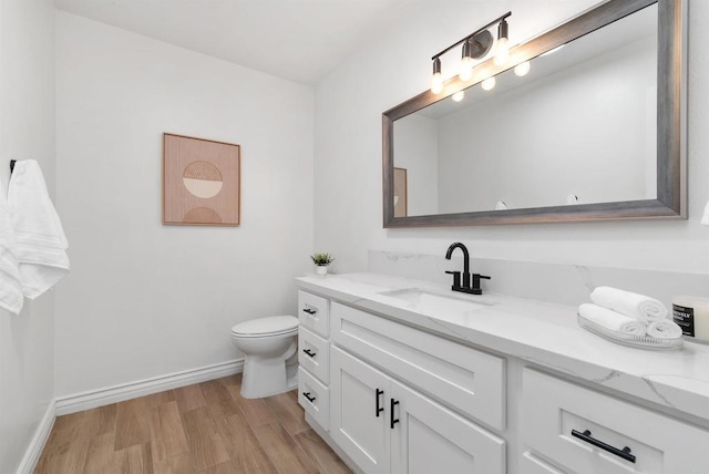 7528 Jerez Ct Unit 6, Carlsbad, CA 92009 - bathroom featuring vanity and wood finished floors