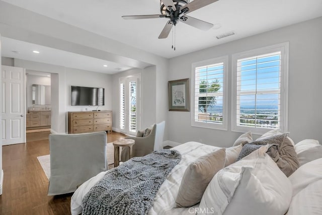 24234 Reyes Adobe Way, Valencia, CA 91354 - bedroom featuring recessed lighting, wood finished floors, and ceiling fan