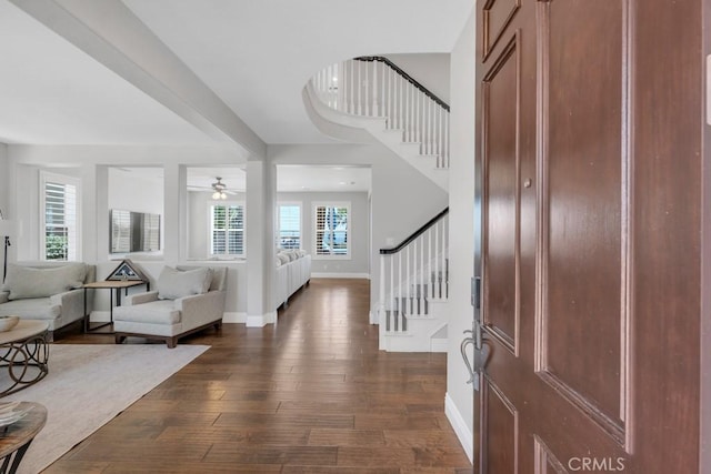 24234 Reyes Adobe Way, Valencia, CA 91354 - entryway with stairs, dark wood-style floors, and ceiling fan