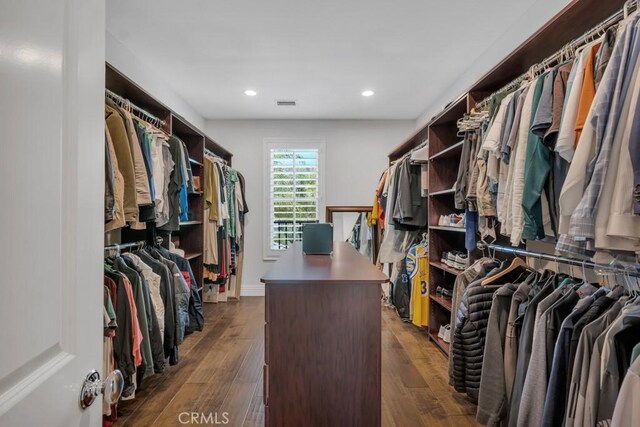 24234 Reyes Adobe Way, Valencia, CA 91354 - spacious closet with dark wood-style floors