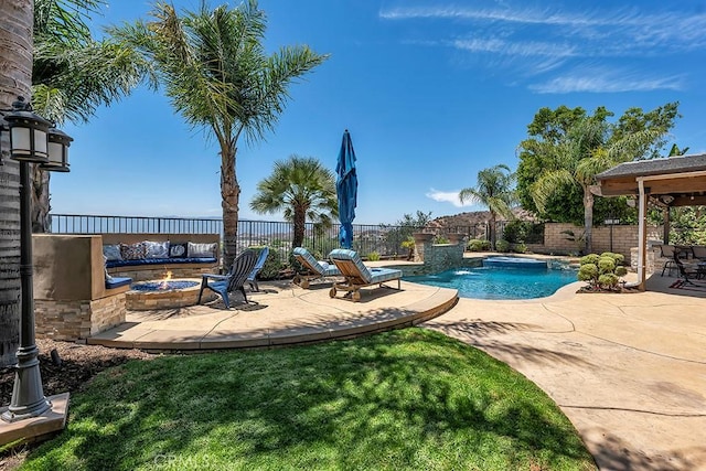 24234 Reyes Adobe Way, Valencia, CA 91354 - view of pool with a fire pit, a patio area, and a fenced backyard