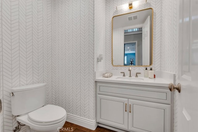 24234 Reyes Adobe Way, Valencia, CA 91354 - bathroom with wallpapered walls and vanity