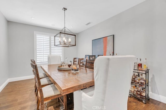 24234 Reyes Adobe Way, Valencia, CA 91354 - dining space featuring a chandelier, wood finished floors, and recessed lighting