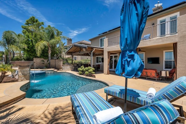 24234 Reyes Adobe Way, Valencia, CA 91354 - view of swimming pool with a fenced backyard and a patio area