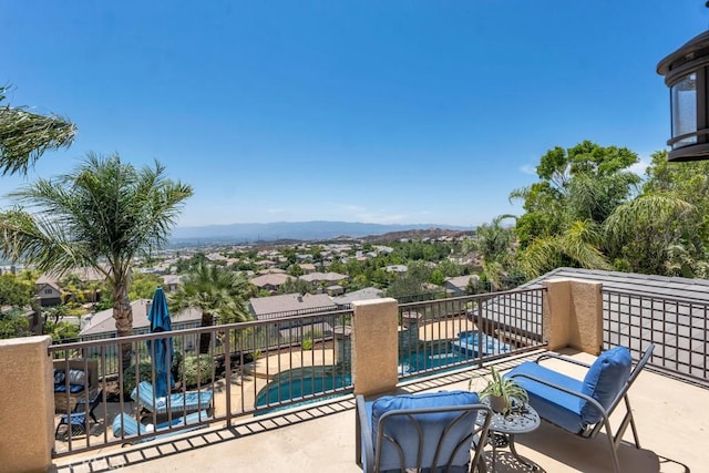 24234 Reyes Adobe Way, Valencia, CA 91354 - balcony with view of pool area and a mountain view