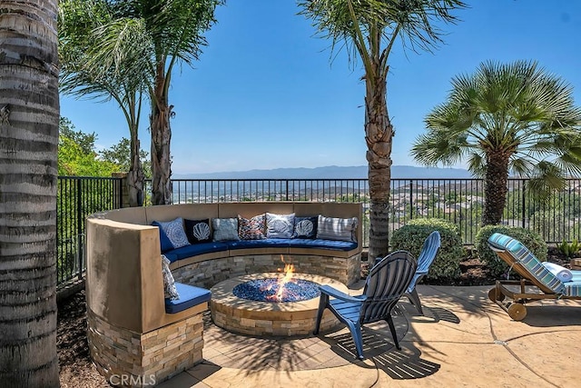 24234 Reyes Adobe Way, Valencia, CA 91354 - fenced backyard with a fire pit and a patio area
