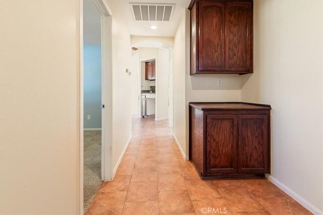 14296 Bieri St, Mojave, CA 93501 - corridor with arched walkways and baseboards