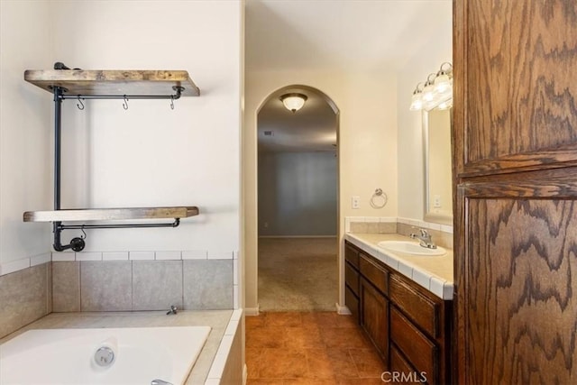 14296 Bieri St, Mojave, CA 93501 - bathroom with vanity, a bath, and tile patterned flooring