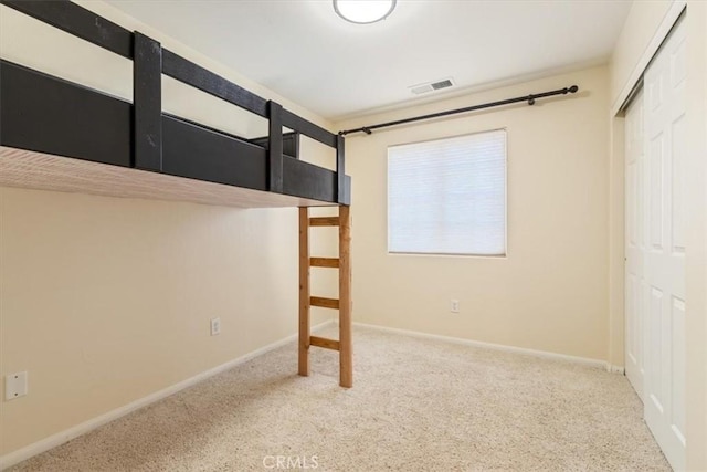 14296 Bieri St, Mojave, CA 93501 - unfurnished bedroom with carpet flooring and a closet