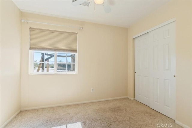 14296 Bieri St, Mojave, CA 93501 - unfurnished bedroom featuring a closet, carpet, and a ceiling fan