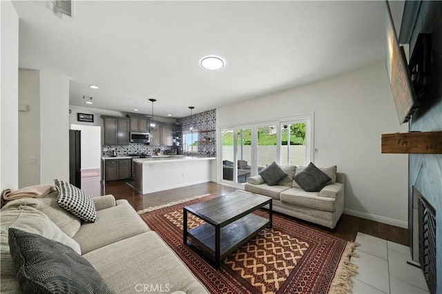 33175 Camino Maraca, Temecula, CA 92592 - living area featuring a fireplace with flush hearth and recessed lighting