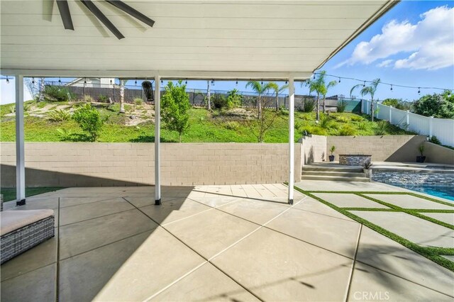 33175 Camino Maraca, Temecula, CA 92592 - fenced backyard featuring a patio area