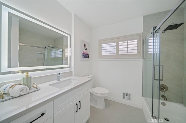 3704 Lorado Way, View Park, CA 90043 - full bathroom with vanity, enclosed tub / shower combo, and tile patterned flooring