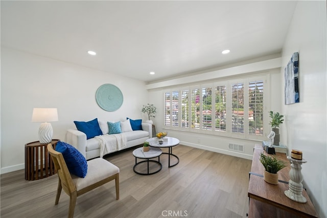 3704 Lorado Way, View Park, CA 90043 - living room featuring wood finished floors and recessed lighting