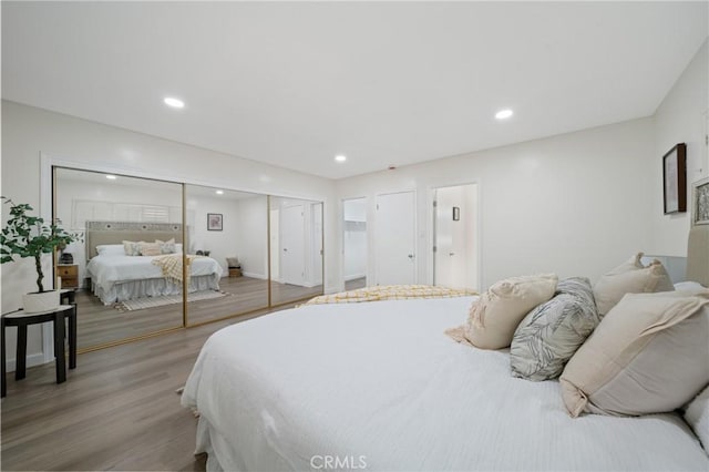 3704 Lorado Way, View Park, CA 90043 - bedroom with light wood-type flooring, recessed lighting, and a closet