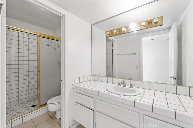 44051 Sheldon Ct, Temecula, CA 92592 - full bathroom featuring vanity, a stall shower, and tile patterned flooring