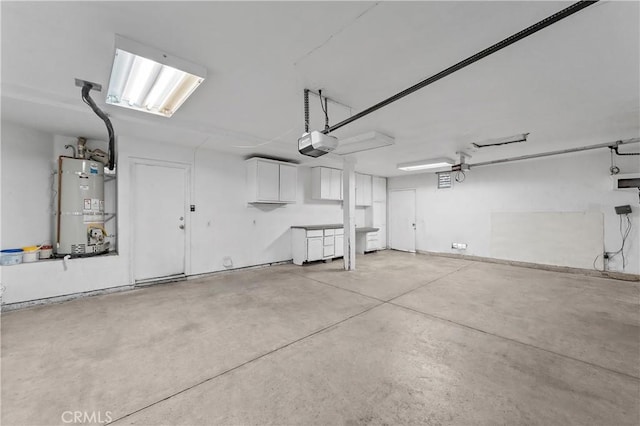 44051 Sheldon Ct, Temecula, CA 92592 - garage featuring water heater and a garage door opener