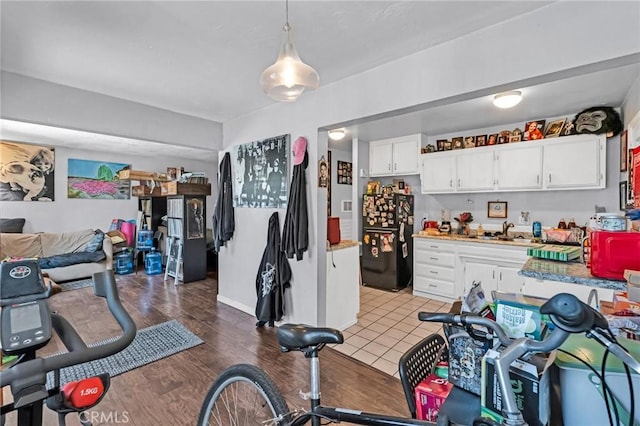 2660 Newell St, County Los Angeles, CA 90039 - workout room featuring a sink and light wood-style flooring