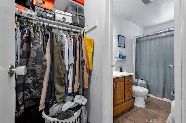 2660 Newell St, County Los Angeles, CA 90039 - bathroom with vanity, tile patterned flooring, and curtained shower