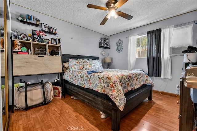 2660 Newell St, County Los Angeles, CA 90039 - bedroom with wood finished floors, a textured ceiling, and ceiling fan