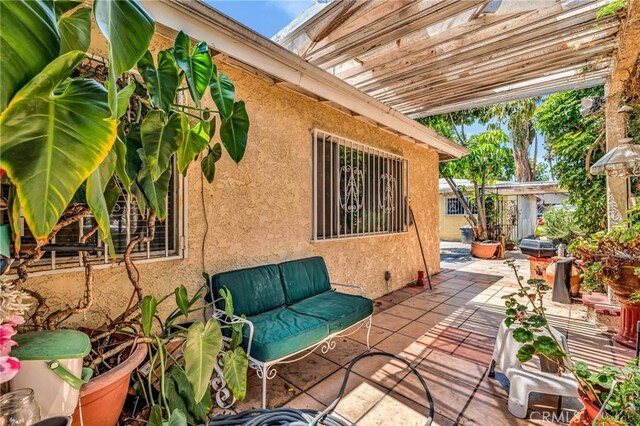 2660 Newell St, County Los Angeles, CA 90039 - view of patio with an outdoor hangout area