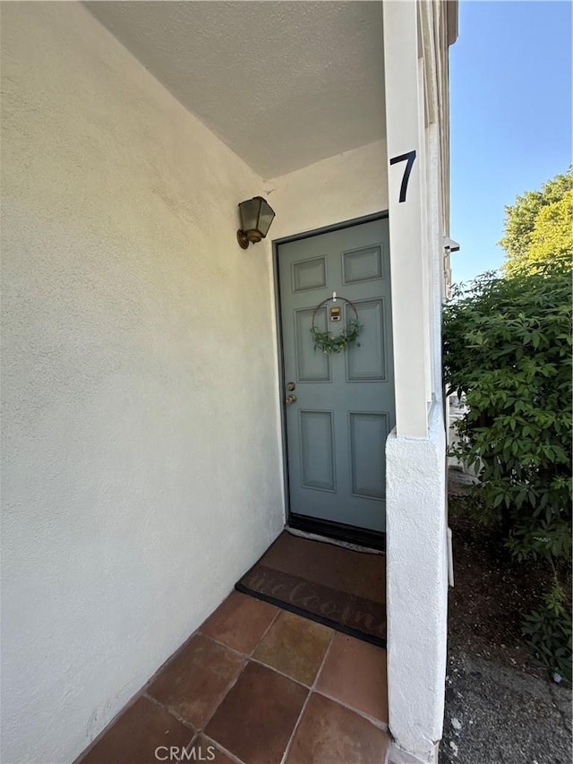16857 San Fernando Mission Blvd Unit 7, Granada Hills, CA 91344 - entrance to property with stucco siding