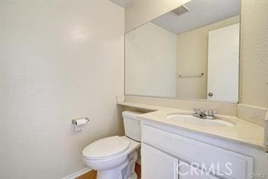16857 San Fernando Mission Blvd Unit 7, Granada Hills, CA 91344 - bathroom featuring toilet and vanity