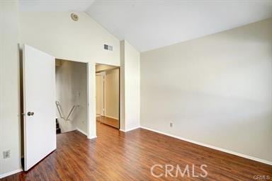 16857 San Fernando Mission Blvd Unit 7, Granada Hills, CA 91344 - unfurnished bedroom featuring wood finished floors and lofted ceiling