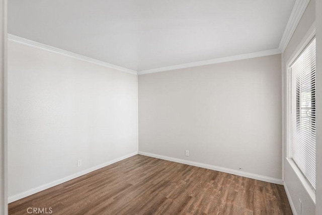 30326 Via Reata, Laguna Niguel, CA 92677 - spare room featuring dark wood-style floors and ornamental molding