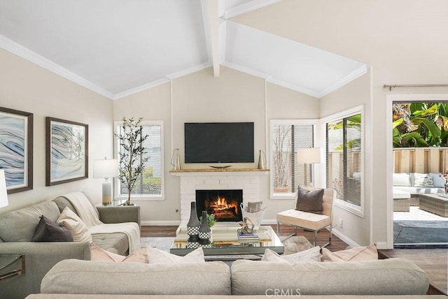 30326 Via Reata, Laguna Niguel, CA 92677 - living area featuring wood finished floors, plenty of natural light, and a brick fireplace