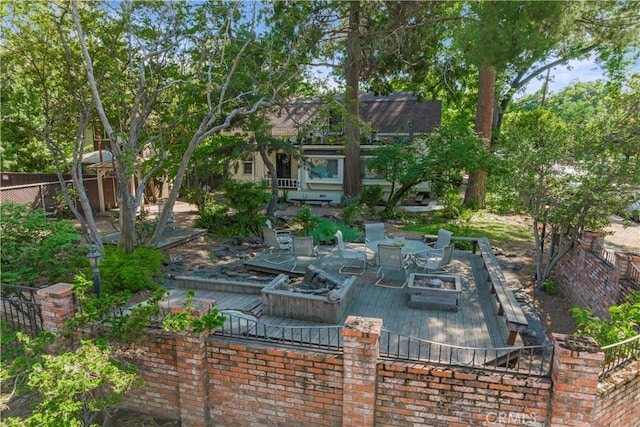 604 Salem St, Chico, CA 95928 - view of patio with a deck and a fire pit