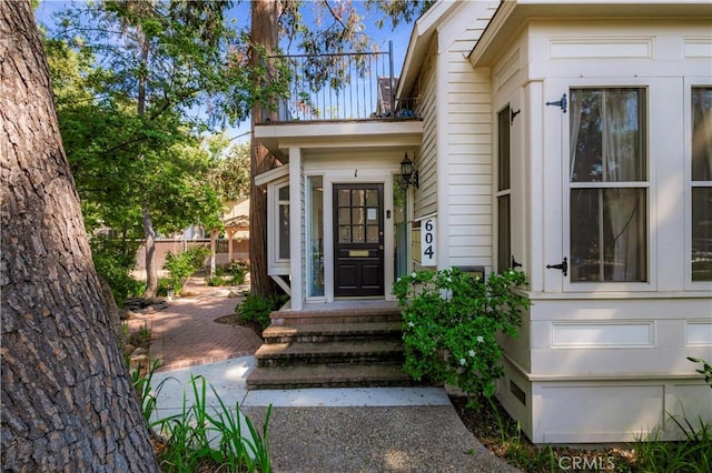 604 Salem St, Chico, CA 95928 - view of exterior entry with a balcony