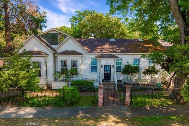 604 Salem St, Chico, CA 95928 - view of front of property featuring a fenced front yard and a shingled roof