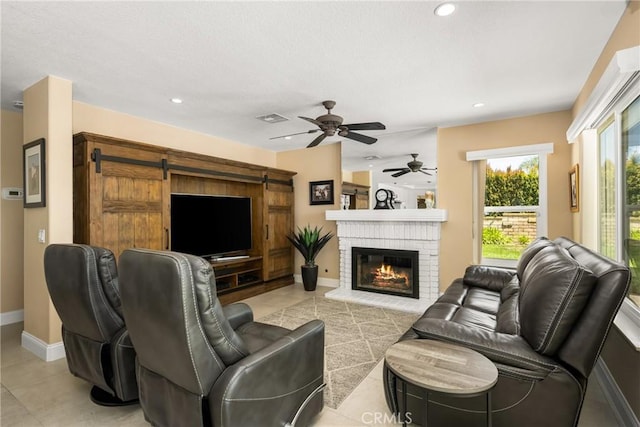 24330 Via Arriba Linda, Yorba Linda, CA 92887 - living area featuring ceiling fan, a fireplace, recessed lighting, a barn door, and light tile patterned floors