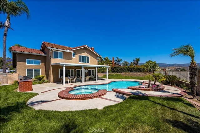 24330 Via Arriba Linda, Yorba Linda, CA 92887 - view of swimming pool featuring a patio area, a fenced backyard, and a pool with connected hot tub