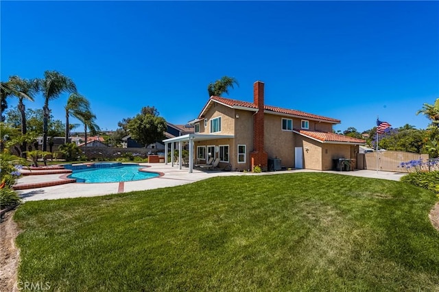 24330 Via Arriba Linda, Yorba Linda, CA 92887 - back of property with a tiled roof, a chimney, a patio, and a fenced backyard