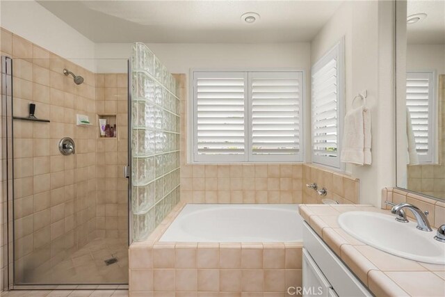 24330 Via Arriba Linda, Yorba Linda, CA 92887 - full bathroom featuring tiled shower, a bath, and healthy amount of natural light