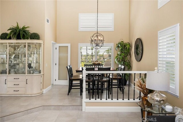 24330 Via Arriba Linda, Yorba Linda, CA 92887 - tiled dining room featuring a high ceiling and a chandelier