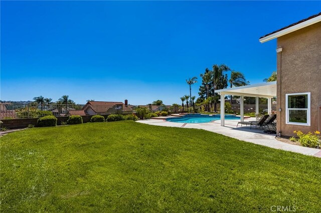24330 Via Arriba Linda, Yorba Linda, CA 92887 - view of grassy yard with a patio area and an outdoor pool