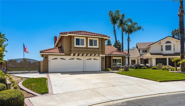 24330 Via Arriba Linda, Yorba Linda, CA 92887 - mediterranean / spanish-style home with a tiled roof, concrete driveway, stucco siding, an attached garage, and a front yard