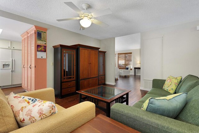 468 Las Brisas Dr, Escondido, CA 92027 - living room featuring dark wood-type flooring, ceiling fan, and a textured ceiling