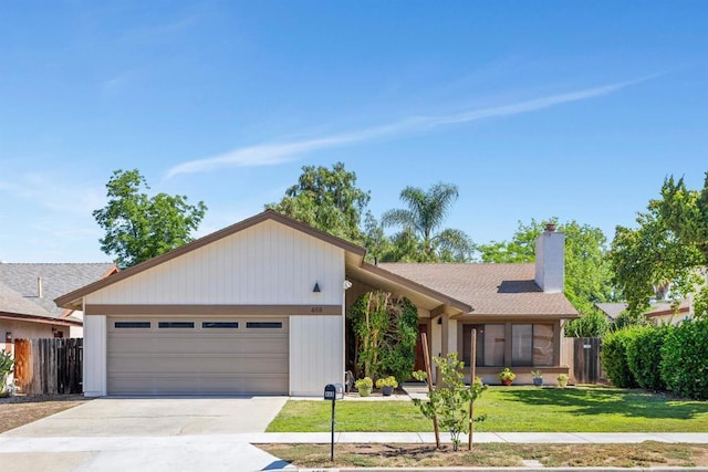 468 Las Brisas Dr, Escondido, CA 92027 - view of front of home featuring an attached garage, a chimney, and driveway