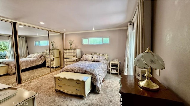 3001 Via Buena Vis Unit C, Laguna Woods, CA 92637 - bedroom with ornamental molding, light colored carpet, multiple windows, a closet, and recessed lighting