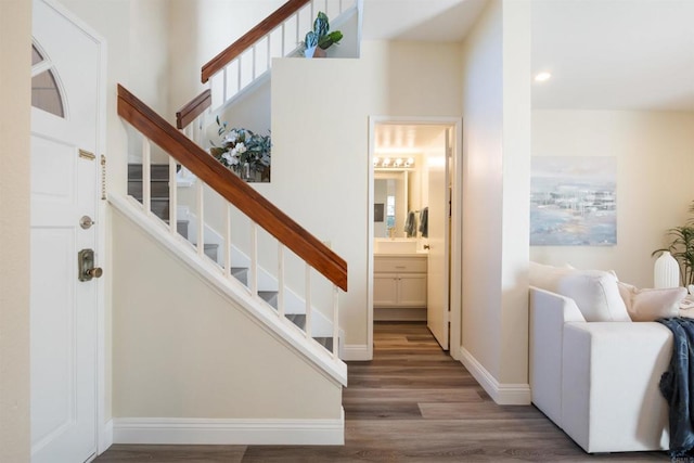 13667 Tiverton Rd, San Diego, CA 92130 - entrance foyer featuring wood finished floors, stairway, and recessed lighting