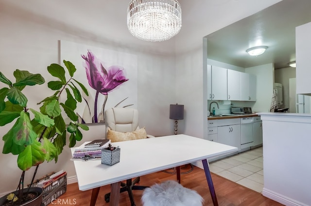 18350 Hatteras St Unit 263, Tarzana, CA 91356 - office area featuring a chandelier and light tile patterned floors