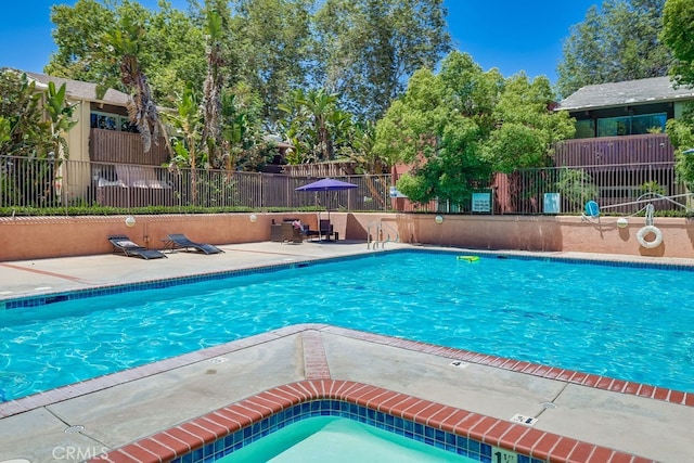 18350 Hatteras St Unit 263, Tarzana, CA 91356 - community pool featuring a patio